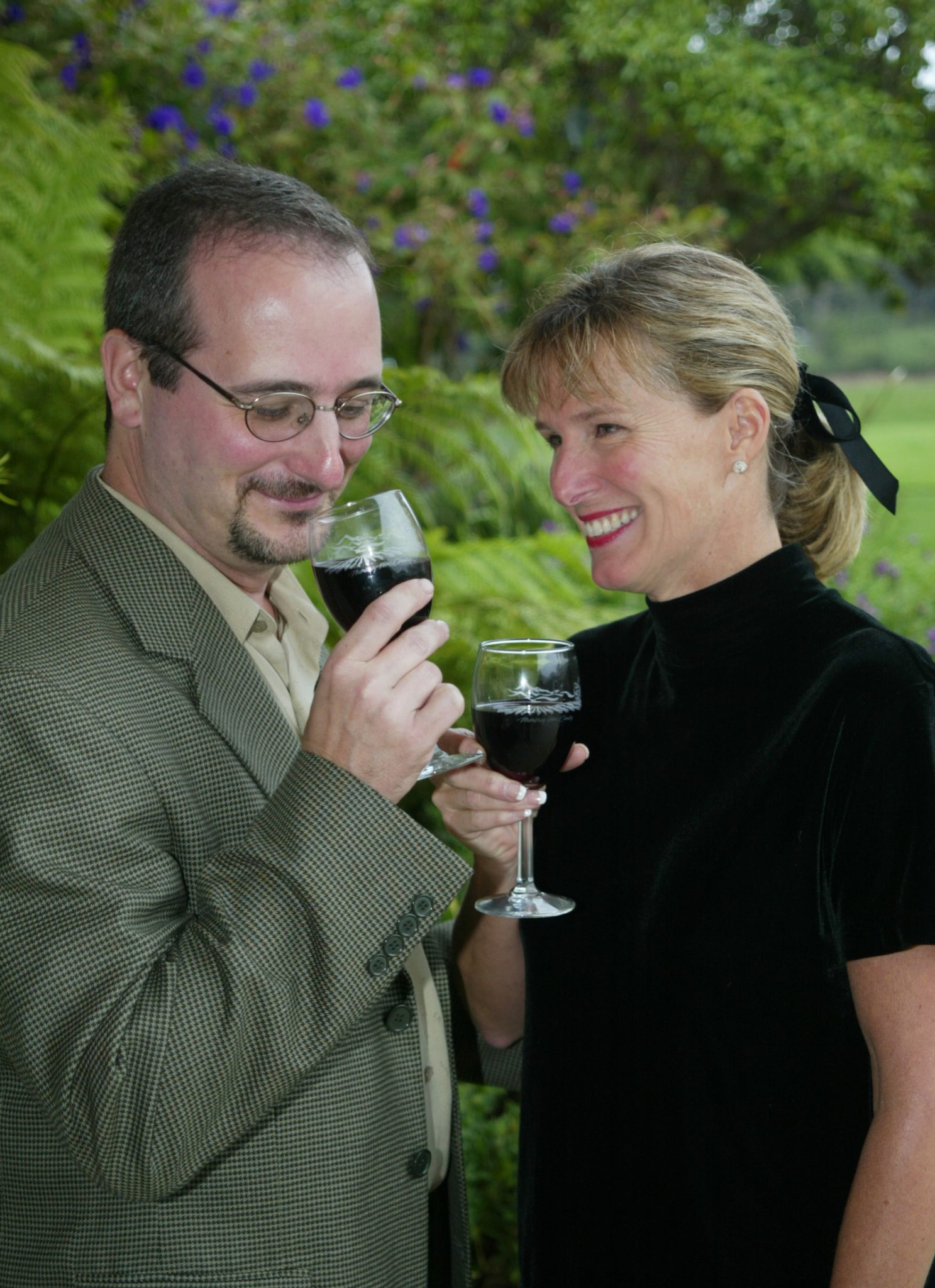 Man and woman tasting wine